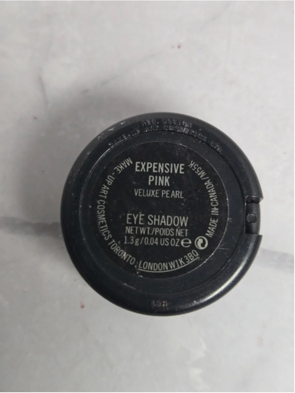 MAC Cosmetics brand Eyeshadow in the Shade Expensive Pink.
